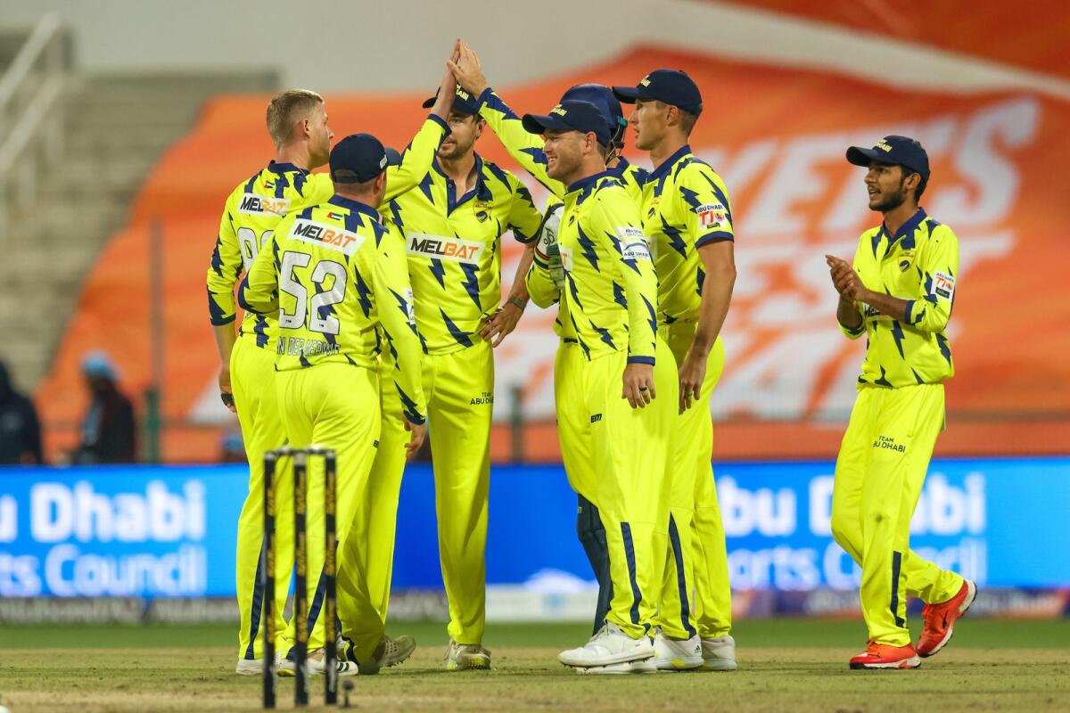 Team Abu Dhabi players celebrate the wicket of Dunith Wellalage of Delhi Bulls. — Supplied photo