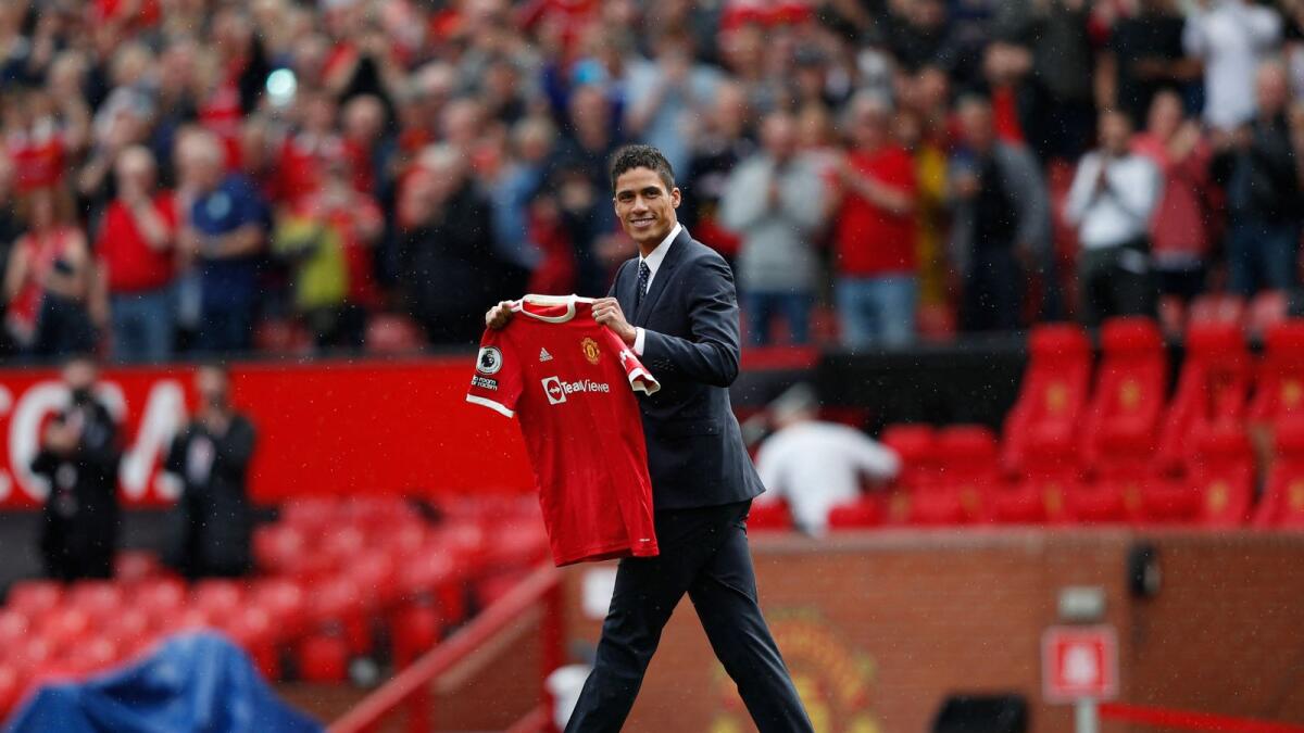 Manchester United's Raphael Varane is presented to the fans ahead of the English Premier League football match between Manchester United and Leeds United. — AFP