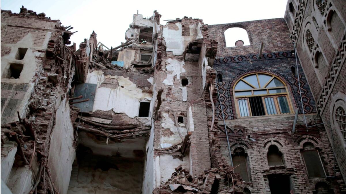 A Unesco-listed historic house collapsed in heavy rains in Sanaa. — AP