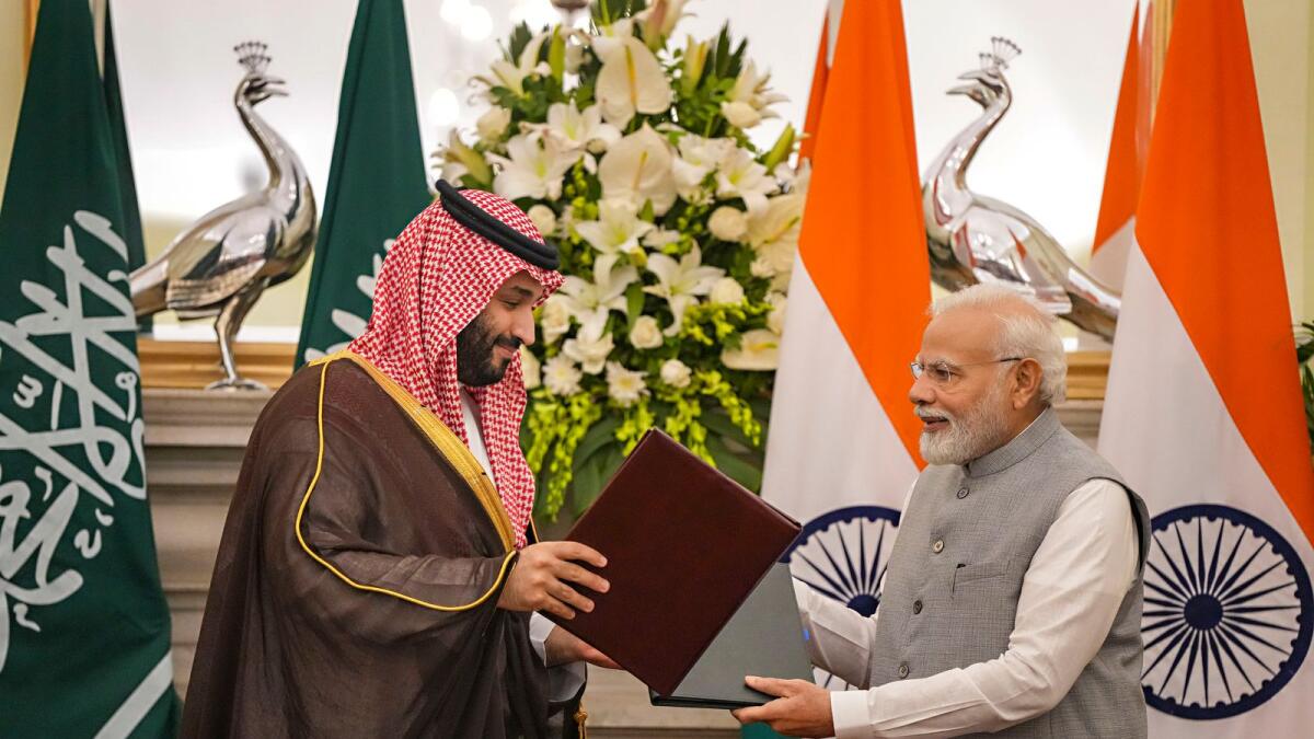 Narendra Modi and Crown Prince Mohammed bin Salman bin Abdulaziz Al Saud during signing of minutes of the first meeting of India-Saudi Arabia Strategic Partnership Council at the Hyderabad House, in New Delhi. — PTI