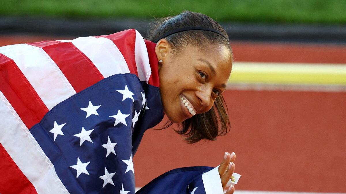 Third placed Allyson Felix of the US celebrates after the mixed 4x400 metres relay at the World Championships. — Reuters
