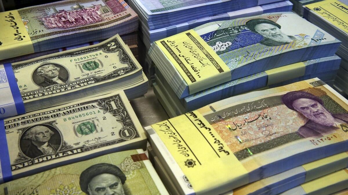 Irans rial hits record-low 100,000 to US dollar     