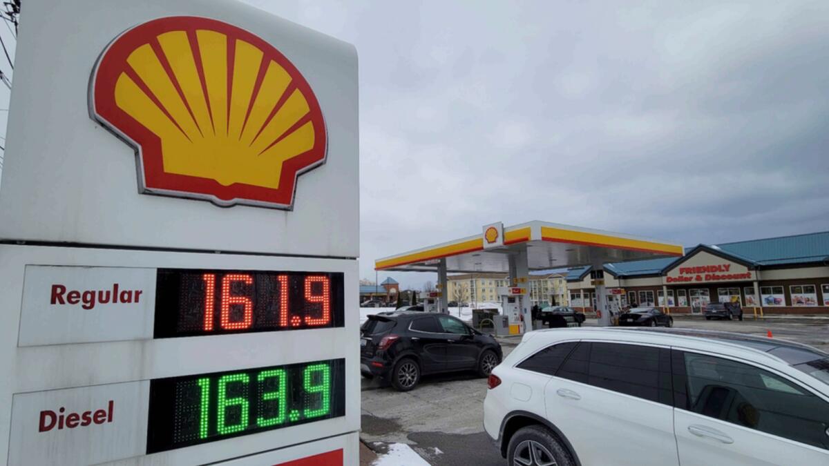 Gas prices are shown per litre at a Newcastle, Ontario, Shell gasoline station. — AP