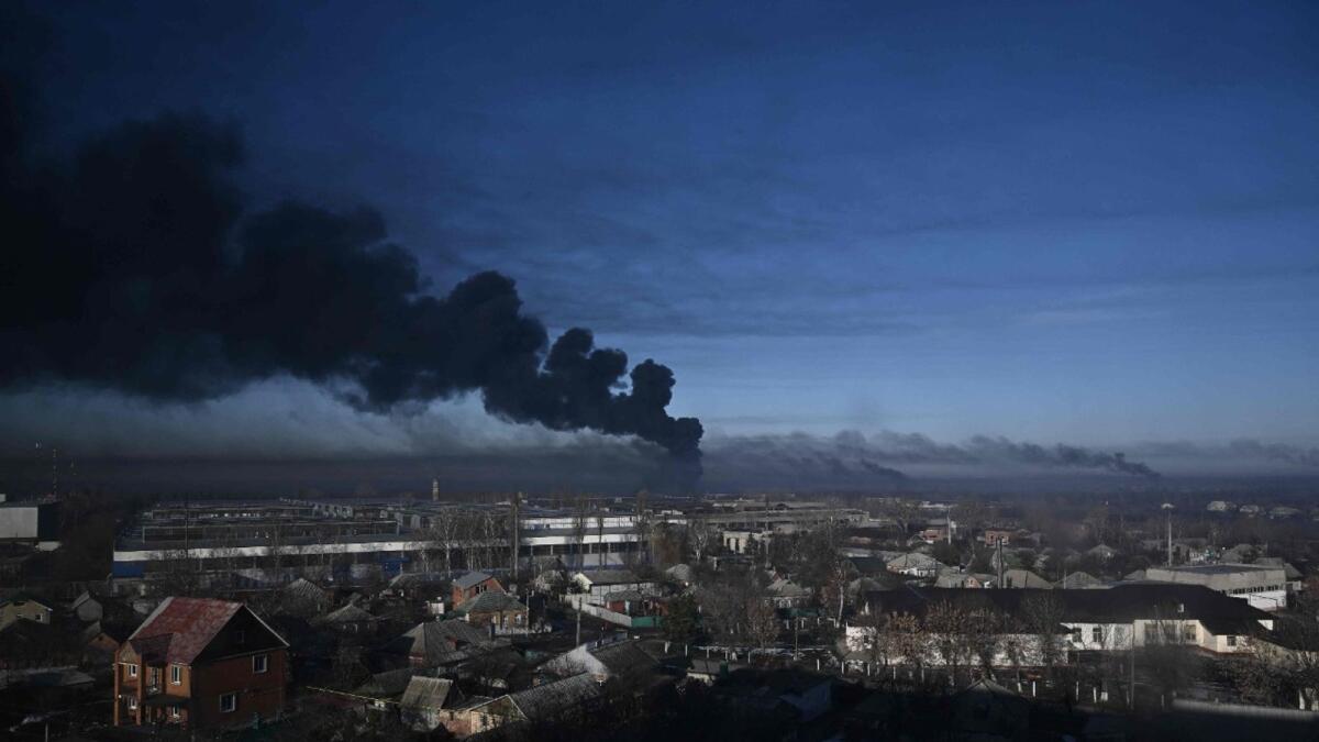 Black smoke rises from a military airport in Chuguyev near Kharkiv  on February 24, 2022.  (Photo: AFP)