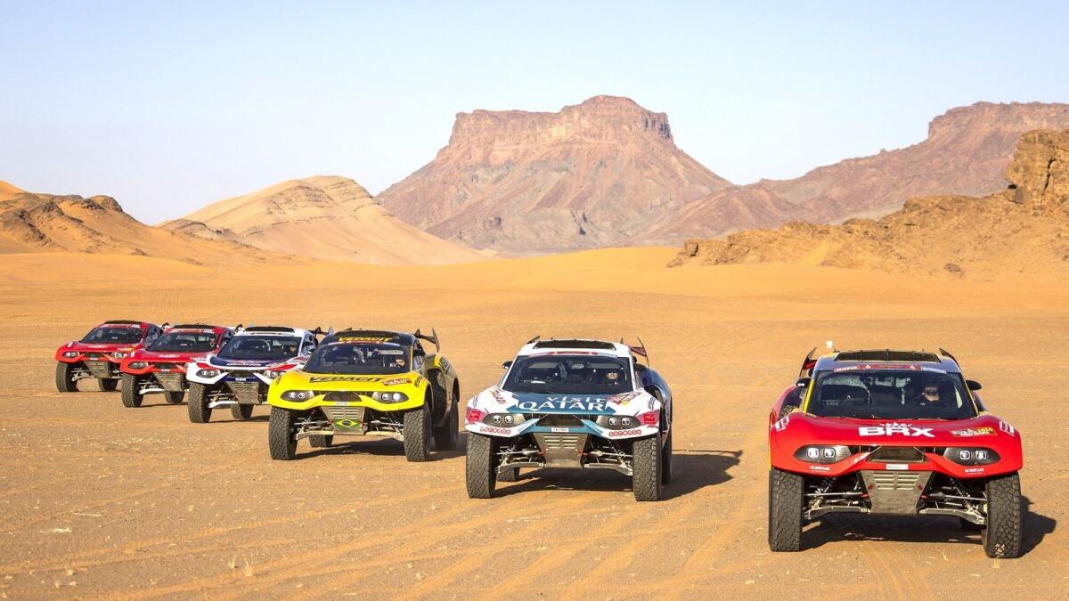 Sebastien Loeb's Bahrain Raid Xtreme Prodrive Hunter (right) is one of six Hunters contesting the Dakar Rally. - Supplied photo