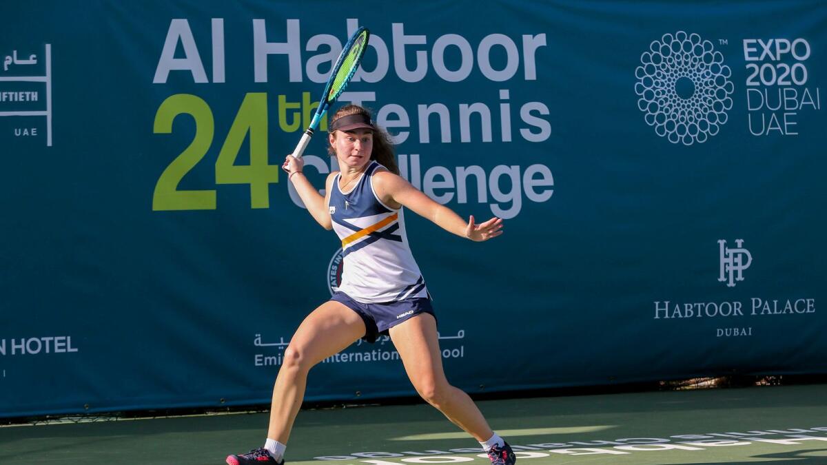 Daria Snigur aims for a forehand return during her match against Xinyu Wang at Al Habtoor Tennis Challenge on Monday. — Supplied photo
