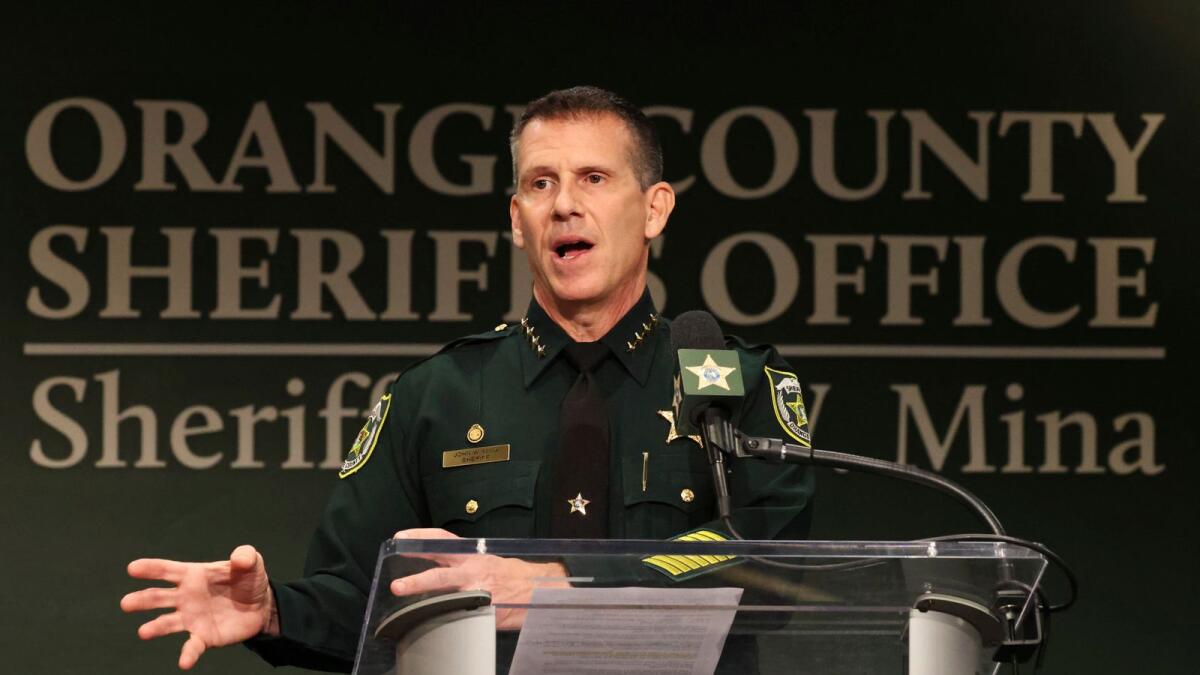 Orange County Sheriff John Mina addresses the media during a press conference about multiple shootings in Orlando, Florida. — AP