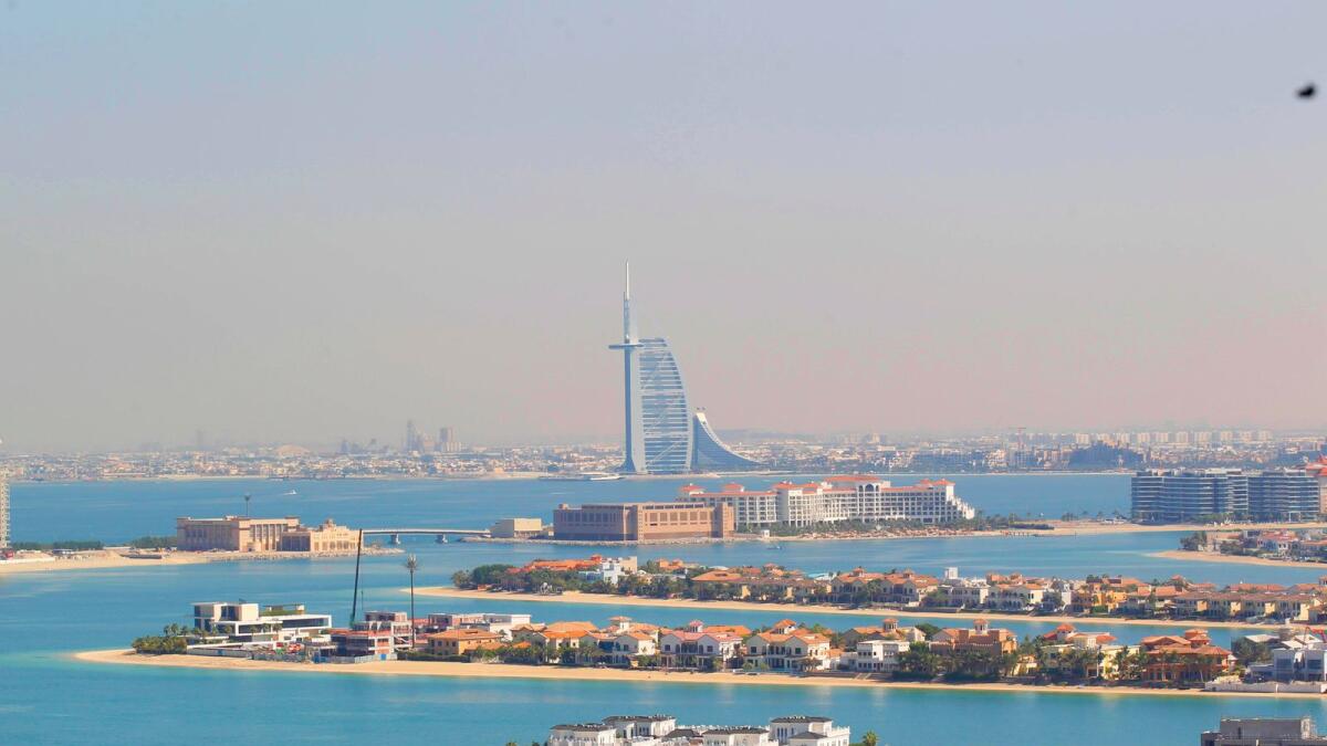 A magnificent view of the fronds of Palm Jumeirah housing the villas with the Burj Al Arab in the background. The highest annual apartment and villa rents were respectively seen in Palm Jumeirah, where average rents reached Dh222,870, and in Al Barari, where average rents reached Dh935,046. — File photo 