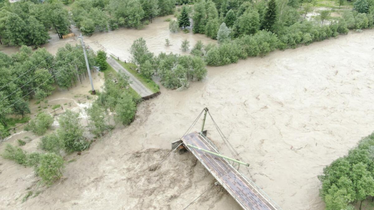 An aerial view shows destroyed bridge over the Chornyi Cheremosh river near the town of Verkhovyna in Ivano-Frankivsk region, Ukraine. Photo: Reuters