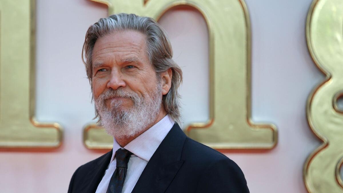 (FILES) In this file photo taken on January 28, 2017 US actor Jeff Bridges arrives on the red carpet for the 2017 Producers Guild Awards at the Beverly Hilton in Beverly Hills, California. - US actor Jeff Bridges announced on Twitter on October 19, 2020 that he has been diagnosed with Lymphoma. (Photo by Daniel LEAL-OLIVAS / AFP)