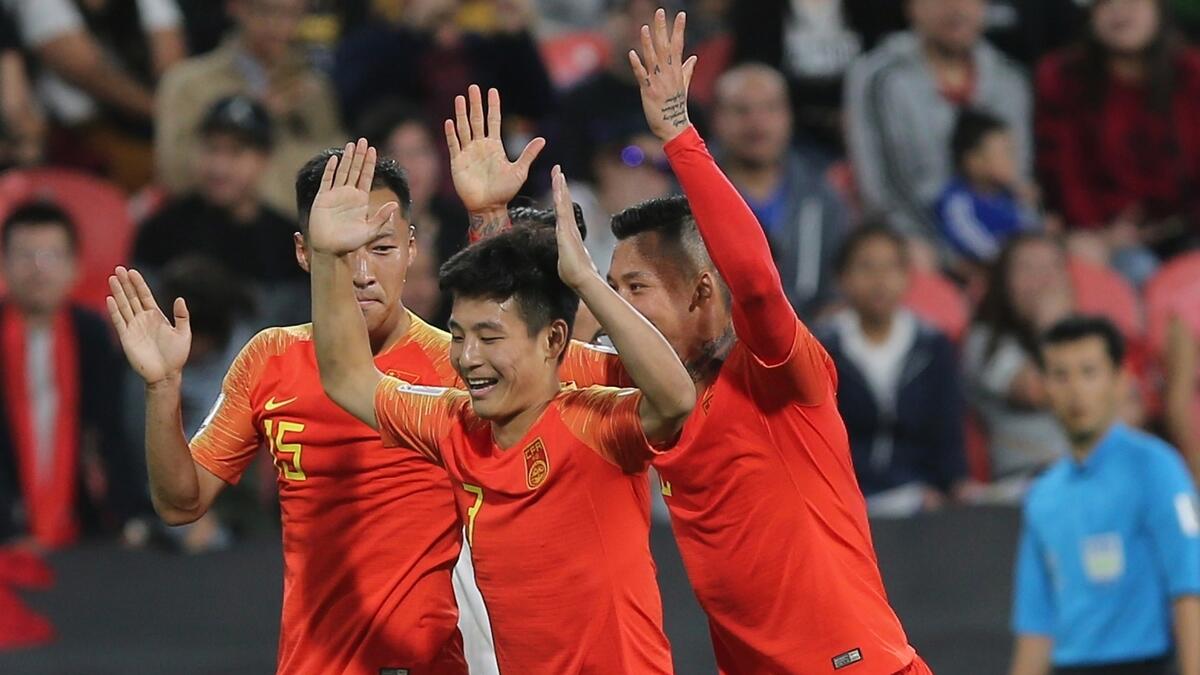 Asian Cup: China storm into knockout round with 3-0 win