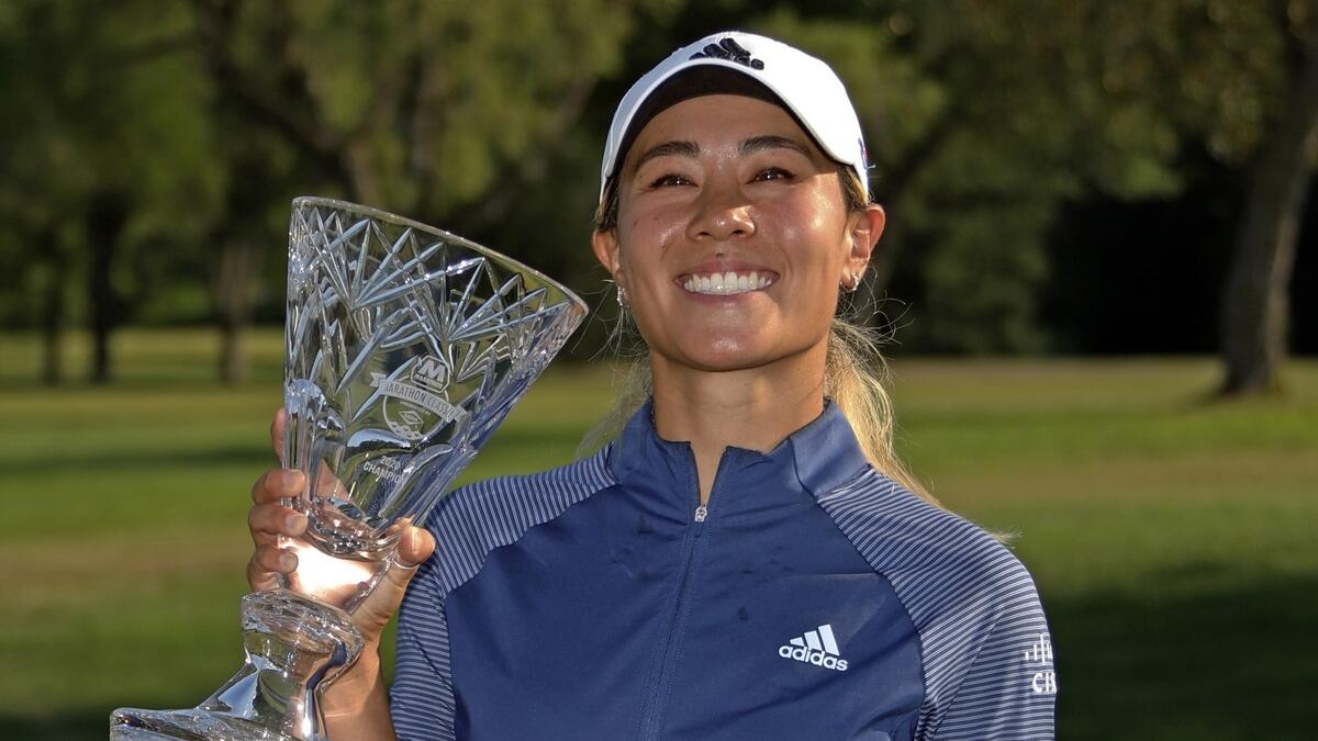 Danielle Kang poses with the trophy for winning the Marathon Classic LPGA golf tournament