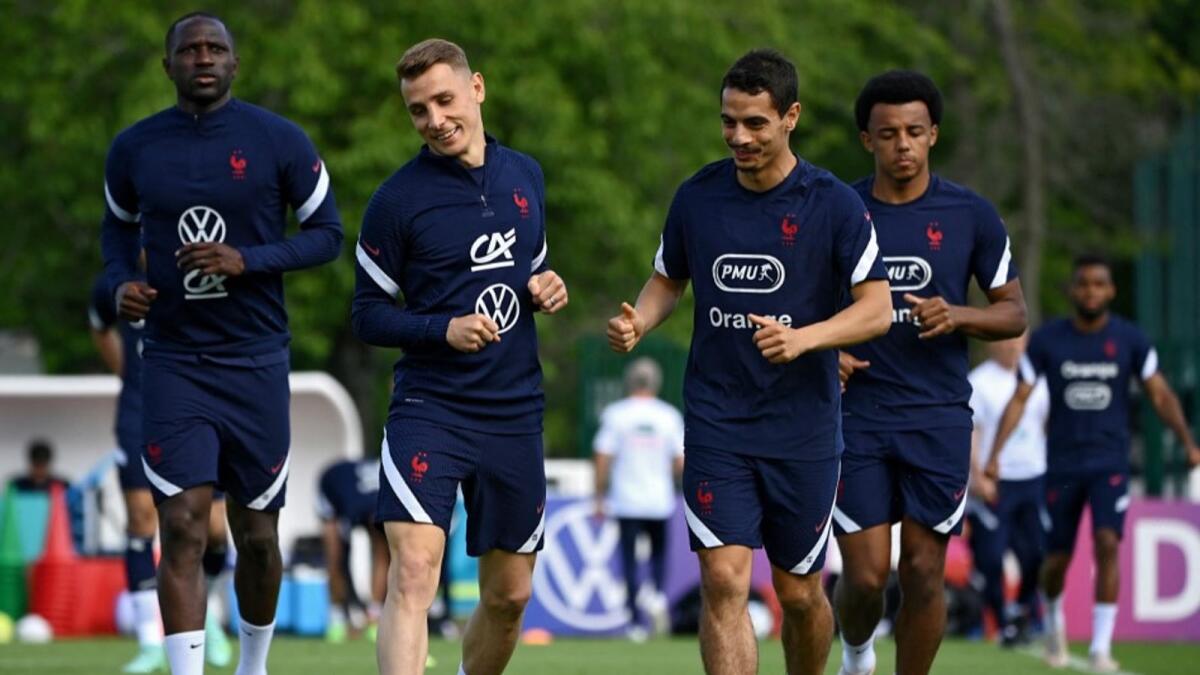 (From left) France's midfielder Moussa Sissoko, defender Lucas Digne, forward Wissam Ben Yedder and defender Jules Kounde attend a training session. (AFP)