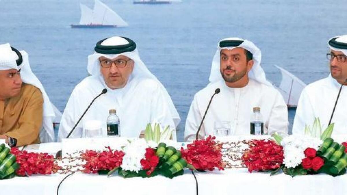 Ahmed Al Rumaithi, Aref Al Awani and other officials announce the launch of the Dhow Dalma Race in Abu Dhabi on Tuesday. The race will see 3,000 sailors taking part in 100 boats.- Supplied photo