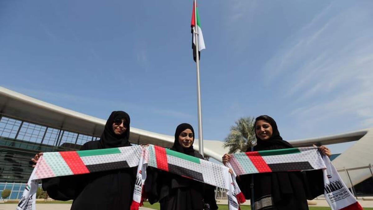 Students, faculty and administration department of Zayed University in Abu Dhabi joined the celebration of UAE Flag Day which also coincides with the accession anniversary of the President, His Highness Shaikh Khalifa bin Zayed Al Nahyan, to the presidency of the country. Photo by Ryan Lim/ Khaleej Times