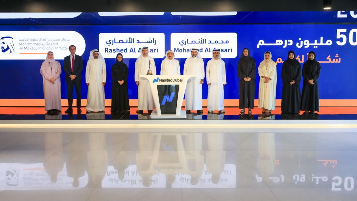 Al Ansari Exchange and Nasdaq Dubai officials mark their support to 1 Billion Meals Endowment. — Supplied photo