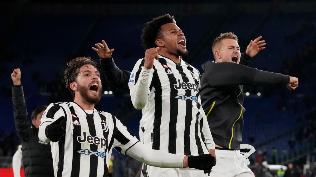 Juventus players celebrate after winning the Italian Serie A match against AS Roma. (AP)