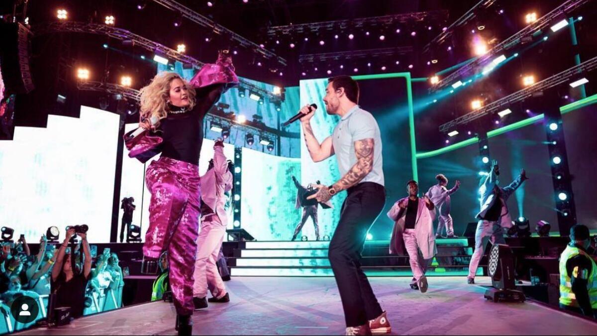 Rita Ora with Liam Payne on stage