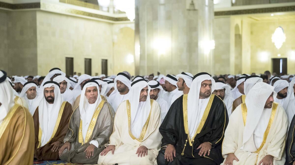 Shaikh Humaid exchange greetings with Shaikhs, senior officials and other dignitaries after Eid Al Adha prayers at the Shaikh Rashid bin Humaid Al Nuaimi Mosque in Ajman.