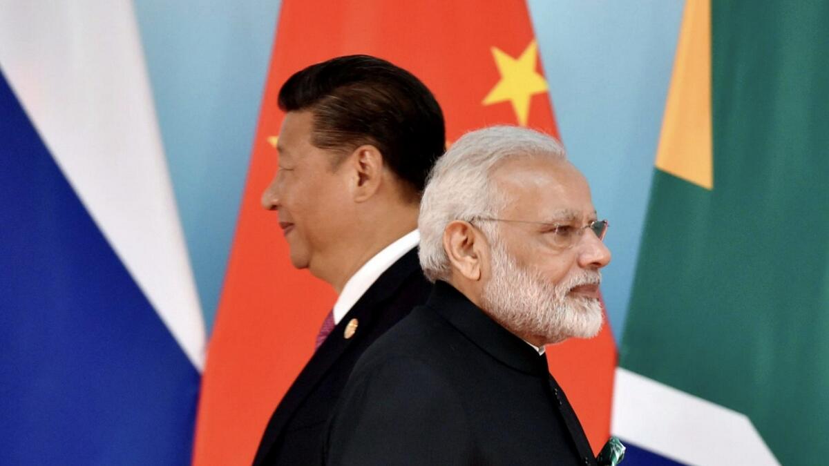 Chinas Xi says hopes to open a new chapter in India ties