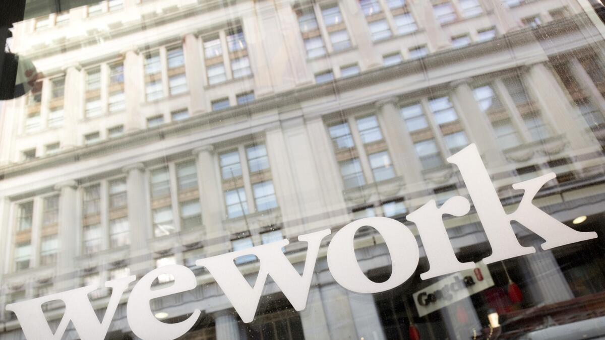 WeWork offices  in New York. WeWork has filed for Chapter 11 bankruptcy protection, marking a stunning fall for the office sharing company once seen as a Wall Street darling that promised to upend the way people went to work around the world. — AP