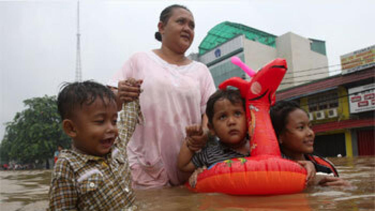 Indonesia floods, landslides kill 17