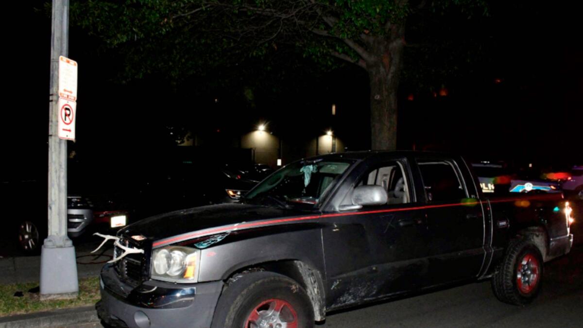 This handout photo released by the US Capitol Police shows a Dodge Dakota pickup truck after a California man was arrested with a bayonet and machete in his vehicle in Washington,DC. — AFP