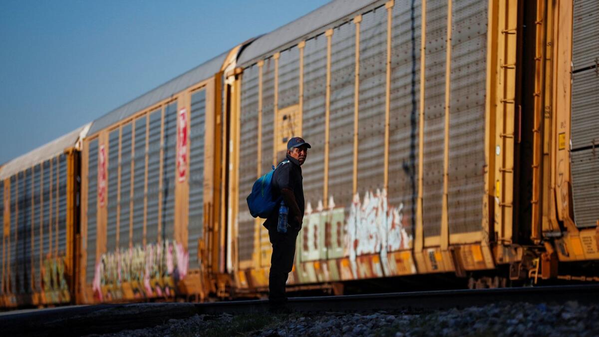 A migrant from Venezuela waits to board a trying to try to reach the US border as he travels through the state of Coahuila, in Ramos Arizpe, Mexico, on September 20, 2023. — Reuters