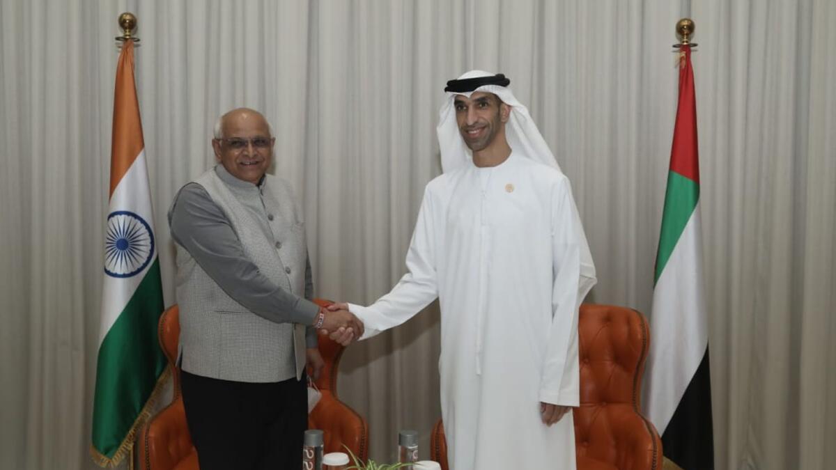 Dr. Thani bin Ahmed Al Zeyoudi, Minister of State for Foreign Trade, with Bhupendra Patel, Chief Minister of Gujrat, during his visit to India Pavilion at Expo 2020 Dubai
