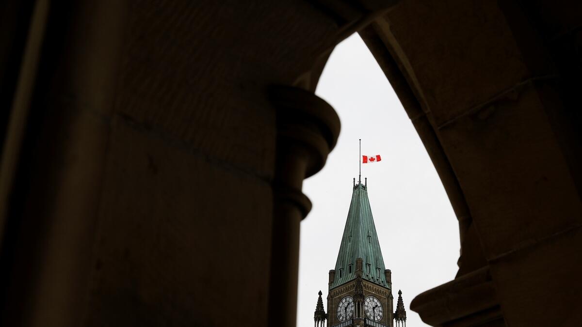 A Canadian flag flies at half mast as the country mourns the loss of citizens in the Iran plane crash.