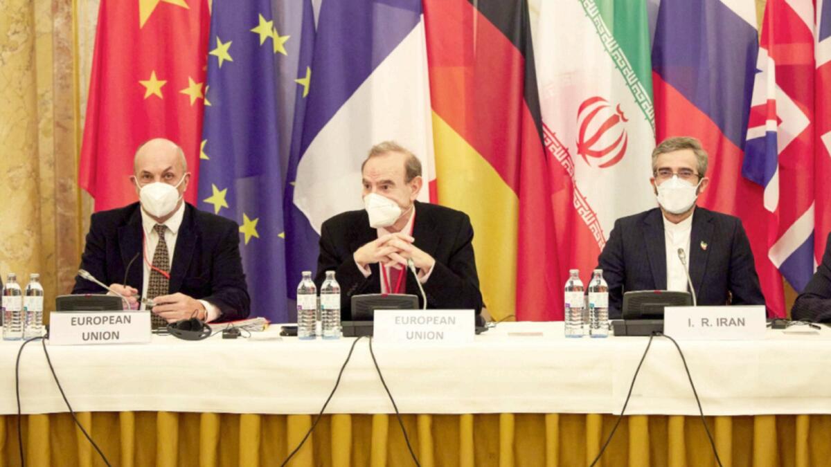 Deputy Secretary General of the European External Action Service (EEAS) Enrique Mora  and Iran's chief nuclear negotiator Ali Bagheri Kani (R) attending a meeting of the joint commission on negotiations aimed at reviving the Iran nuclear deal in Vienna. — AFP