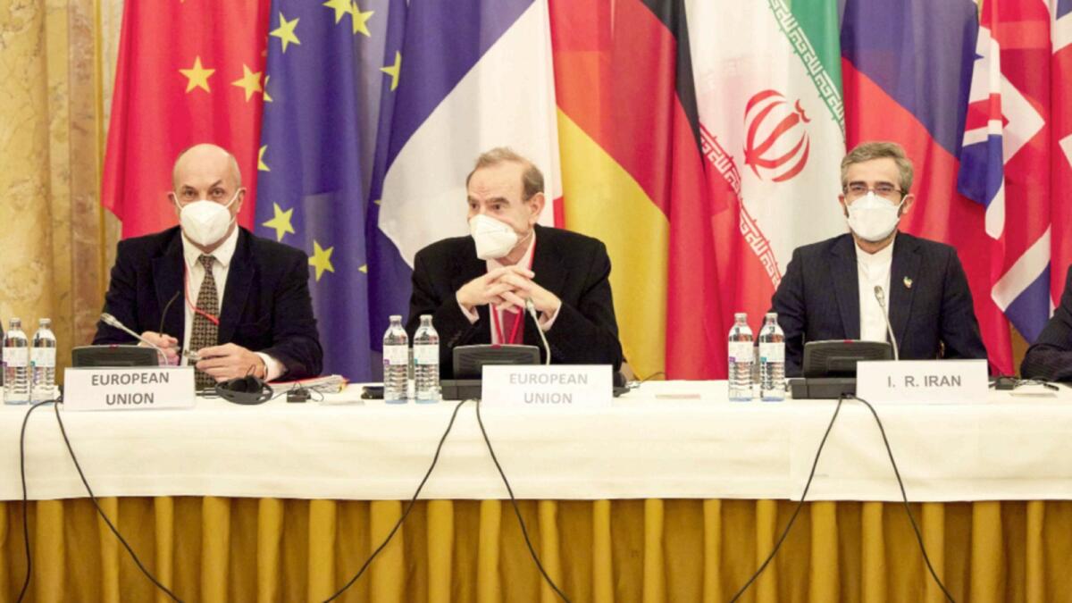 Deputy Secretary General of the European External Action Service (EEAS) Enrique Mora  and Iran's chief nuclear negotiator Ali Bagheri Kani (R) attending a meeting of the joint commission on negotiations aimed at reviving the Iran nuclear deal in Vienna. — AFP