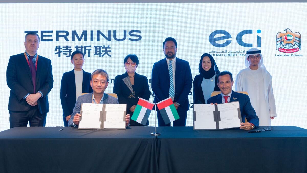 Lance Wang, Vice President of Terminus Group, and Massimo Falcioni, CEO of ECI with officials from both companies. — Supplied photo