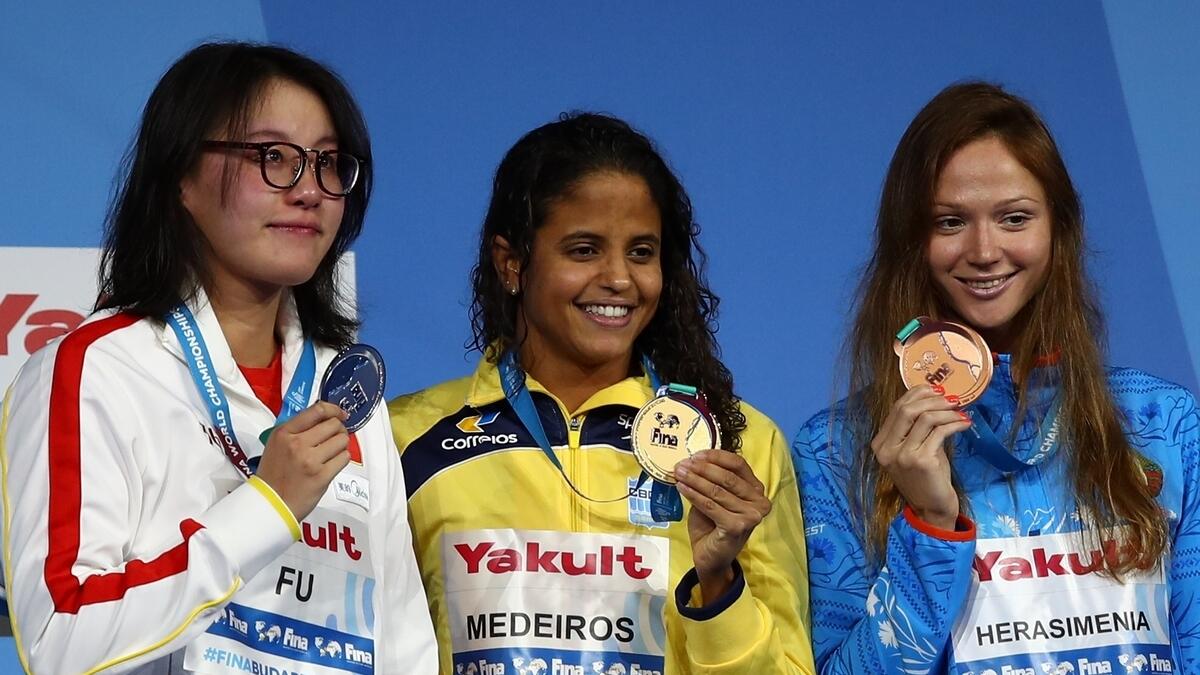 Swimming: Medeiros wins womens 50m backstroke gold on wall