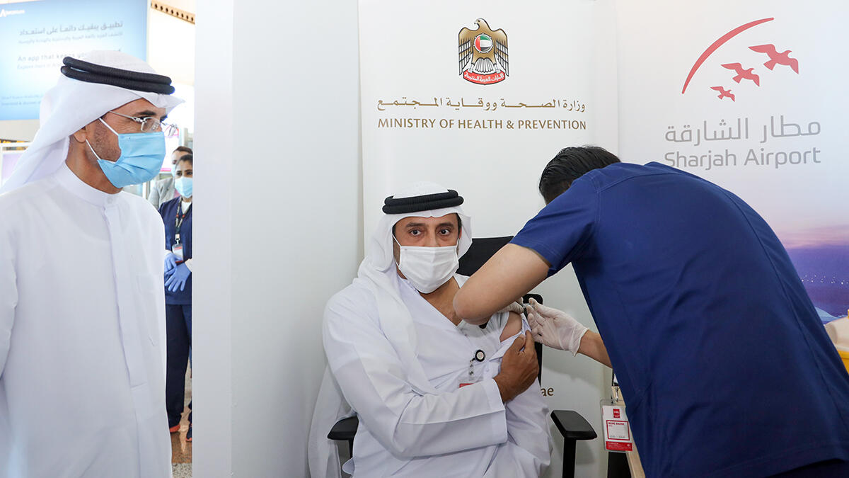 sharjah airport, covid-19 vaccine, coronavirus, first dose of vaccine, frontline workers