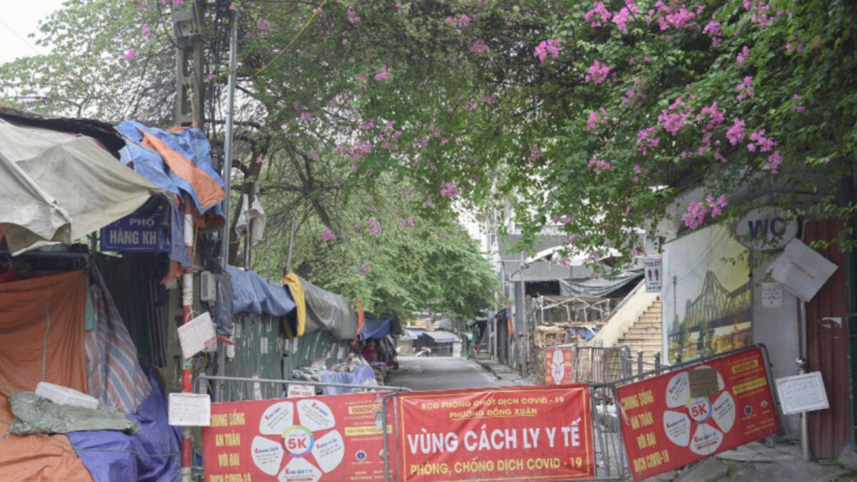 A barrier placed in a quarantine area in Hanoi. — Reuters