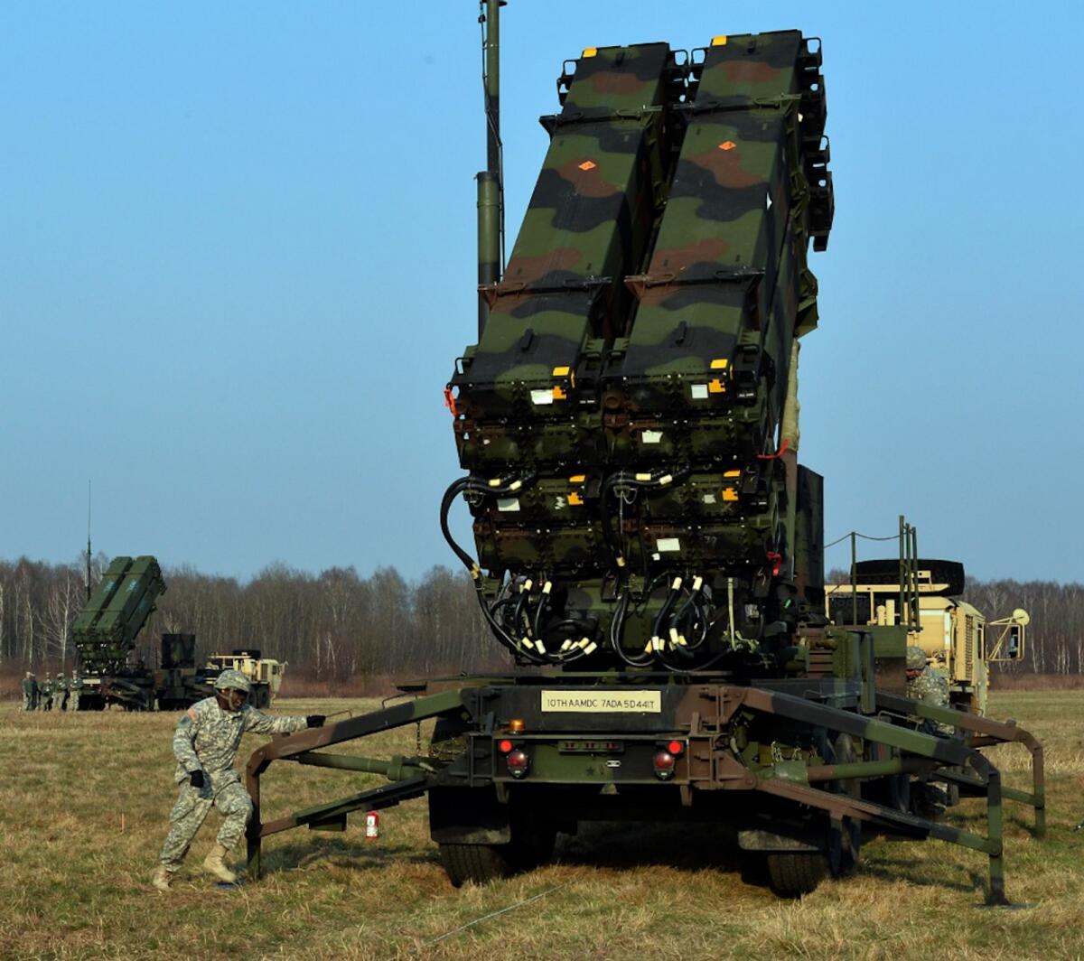 FILE. US troops from the 5th Battalion of the 7th Air Defense Regiment emplace a launching station of the Patriot air and missile defence system at a test range in Sochaczew, Poland, on March 21, 2015. Photo: AFP