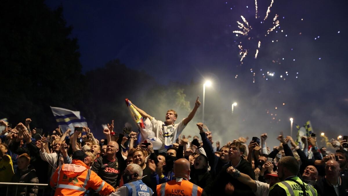 Leeds United fans celebrate winning the Championship