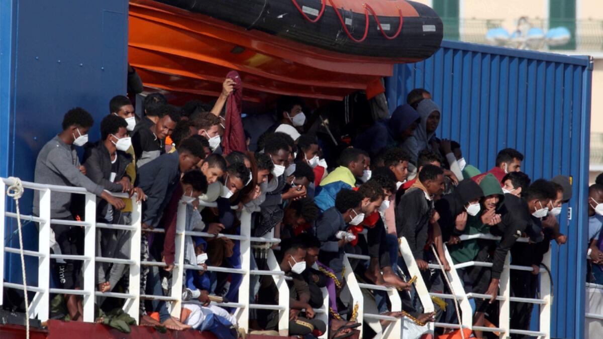 The Sea Eye 4 ship with over 800 rescued people on board arrives in Trapani, Sicily. — AP
