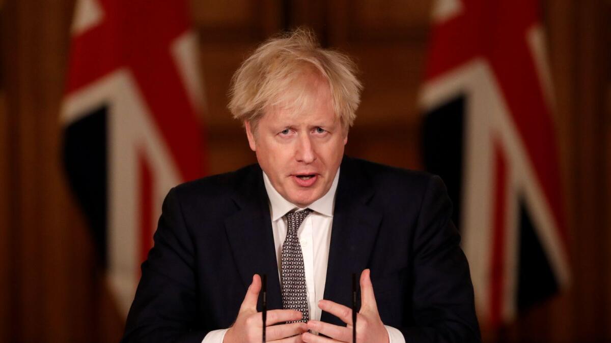 Britain's Prime Minister Boris Johnson speaks during a news conference about the ongoing situation with the coronavirus disease (COVID-19) pandemic, inside 10 Downing Street, in London, Britain, December 16, 2020.
