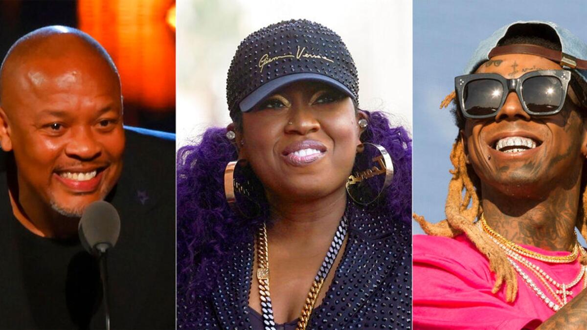 This combination of photos show Dr. Dre, from left, Missy Elliott and Lil Wayne who will be honored at the Recording Academy’s second annual Black Music Collective event during Grammy week next month. The academy announced Wednesday that the three Grammy winners along with music executive Sylvia Rhone will receive the Global Impact Award for their personal achievement in the music industry.  (AP Photo)
