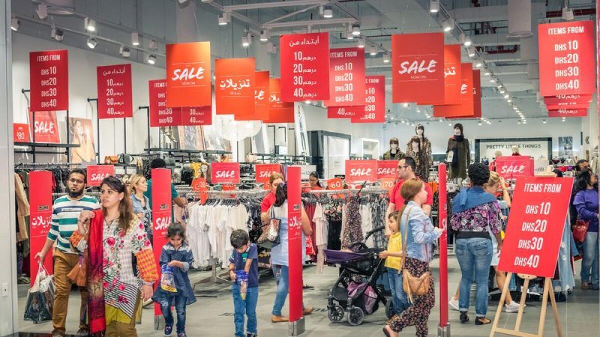 Shoppers at a mall in Dubai. Retail constitutes a key component of Dubai's non-oil economy. — File photo