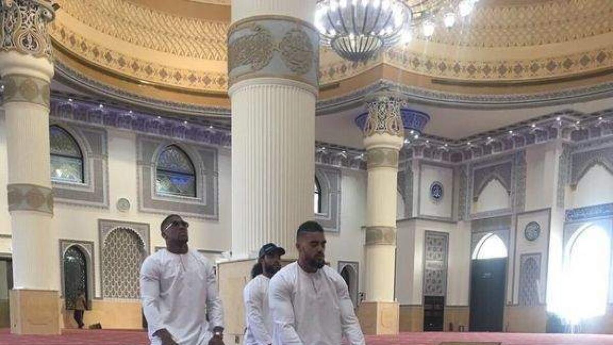 Photos: British boxer Anthony Joshua abused online for praying in Dubai mosque