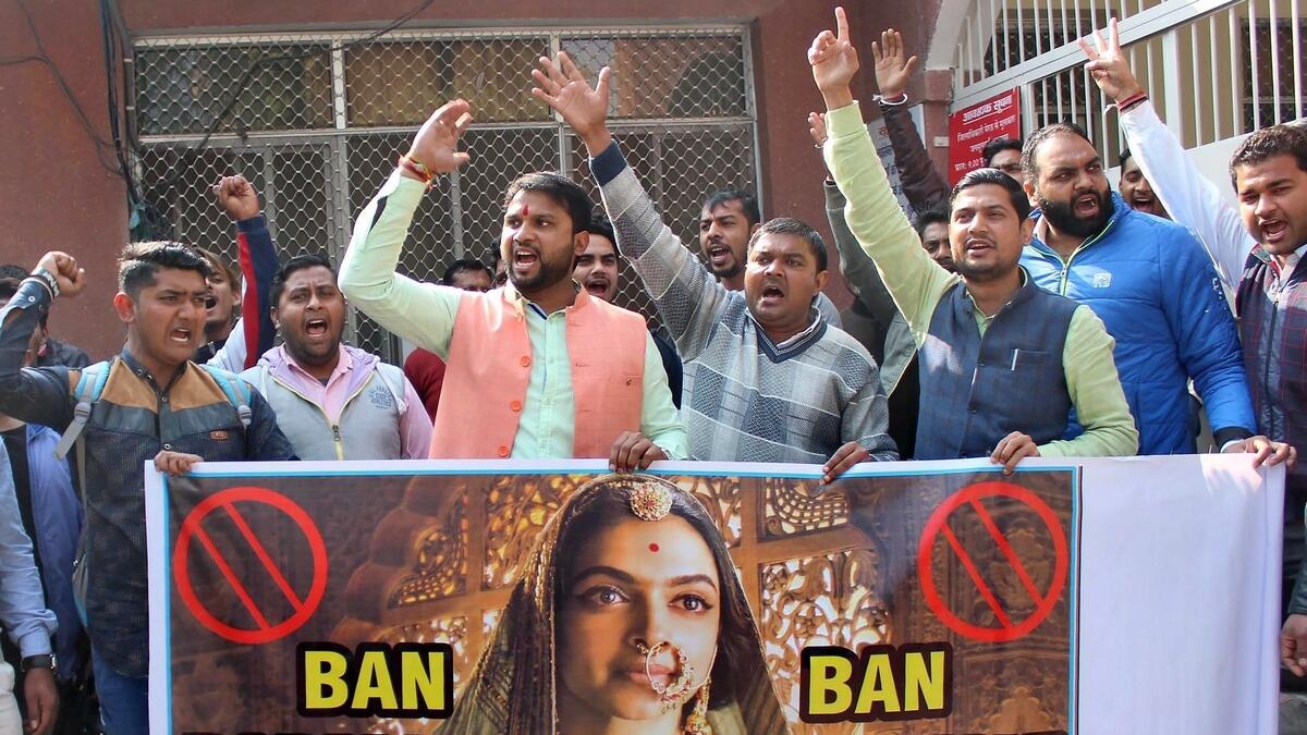 People holding a banner during a protest demanding ban over the screening of film Padmaavat directed by Sanjay Leela Bhansali.- PTI