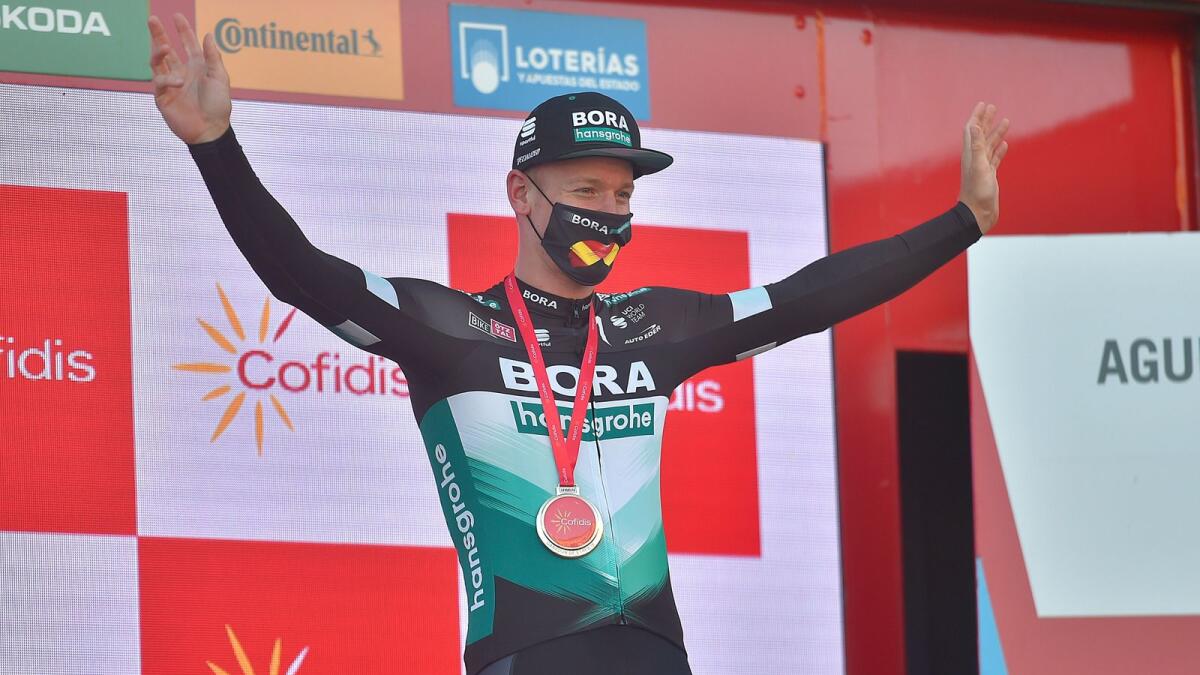 Bora-Hansgrohe's German rider Pascal Ackermann poses on the podium after winning the 9th stage of the 2020 La Vuelta cycling tour of Spain. — AFP