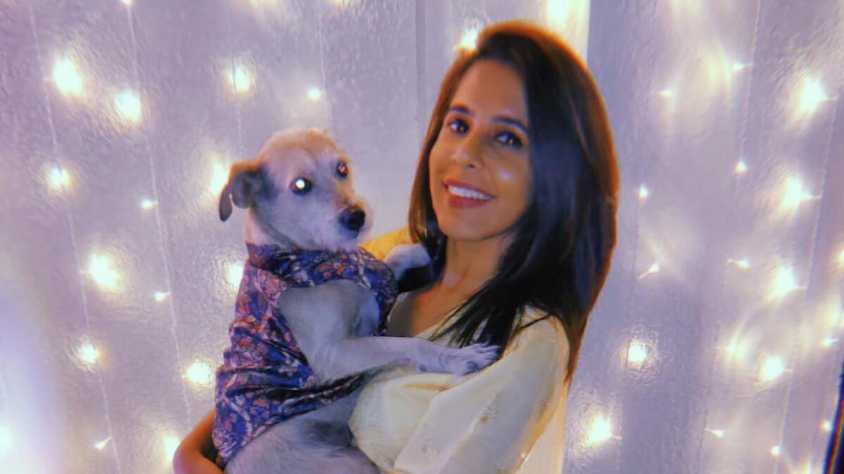Jyotsna Kanjhan, an accounting professional and Dubai expatriate with her pet dog Charlie for Diwali last year. Supplied photo