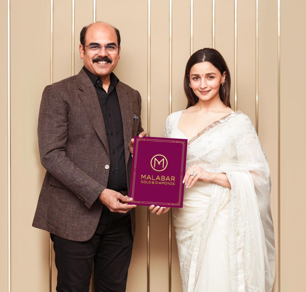 Alia Bhatt with Asher O, Managing Director - India of Malabar Gold &amp; Diamonds. - Supplied photo