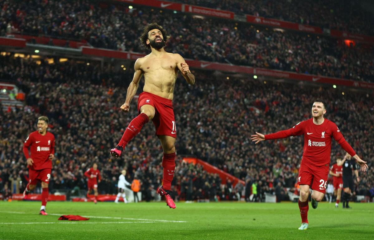 Liverpool's Mohamed Salah celebrates after scoring his team's sixth goal. — Reuters