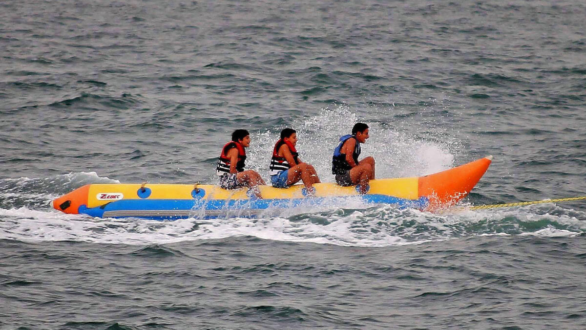 The children are having a good time on the tube boat ride at the Mamzar beach in Dubai – Photo by M.Sajjad/ Khaleej Times