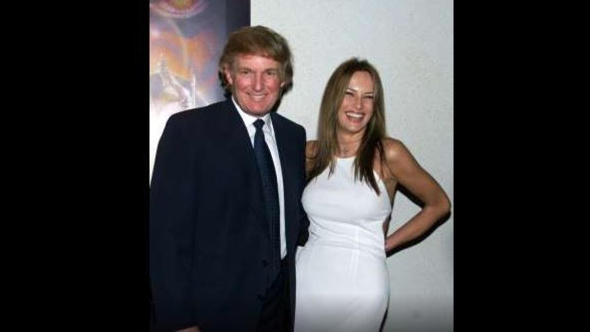 Donald Trump and friend Melania Knauss arrive at the New York premiere of Star Wars Episode I: 'The Phantom Menace,' May 16, 1999.
